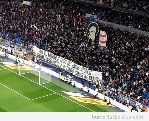 Pancarta de cuarto milenio en el Bernabéu entre el Real Madrid y el Atlético de Madrid