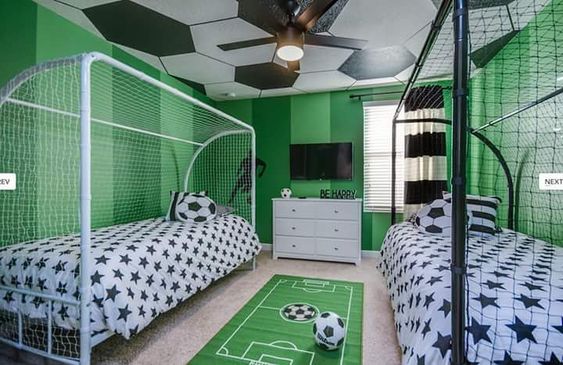 Habitación fútbol con porterías en la cama